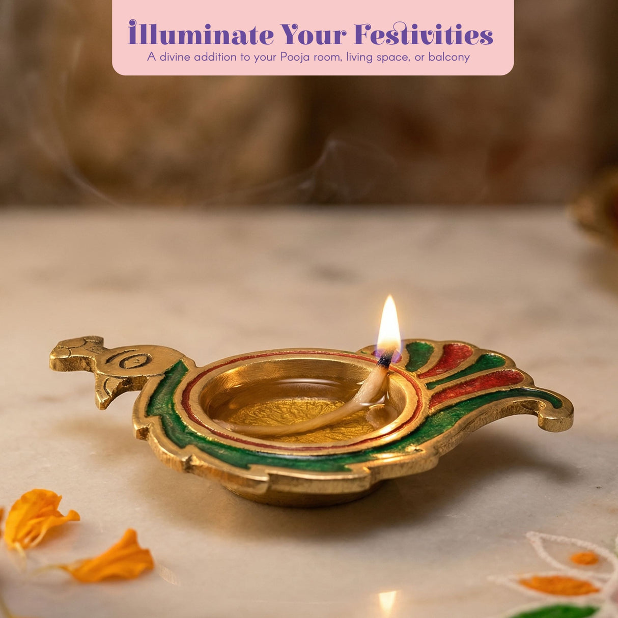 A golden brass peacock deepam diya with green and red enamel detailing and a flame burning for diwali puja decor