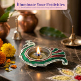 Peacock deepam brass finish diya with vibrant green and red colors and silver metallic finish for diwali and puja decor