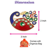 Decorative peacock haldi kumkum holder with vibrant red blue enamel green accents and clear crystals in gold-tone metal