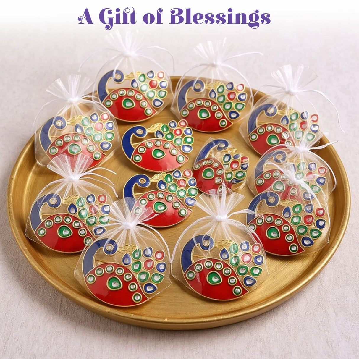 Decorative bulk peacock haldi kumkum holders in red and blue enamel charms with organza bags for indian festivals