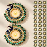 Peacock tealight candle holder in gold tone with emerald green and blue enamel feathers, pearls, and rhinestones for decor