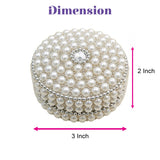 Pearl jewelry box adorned with silver-toned center gem and layered beads for travel and special occasions