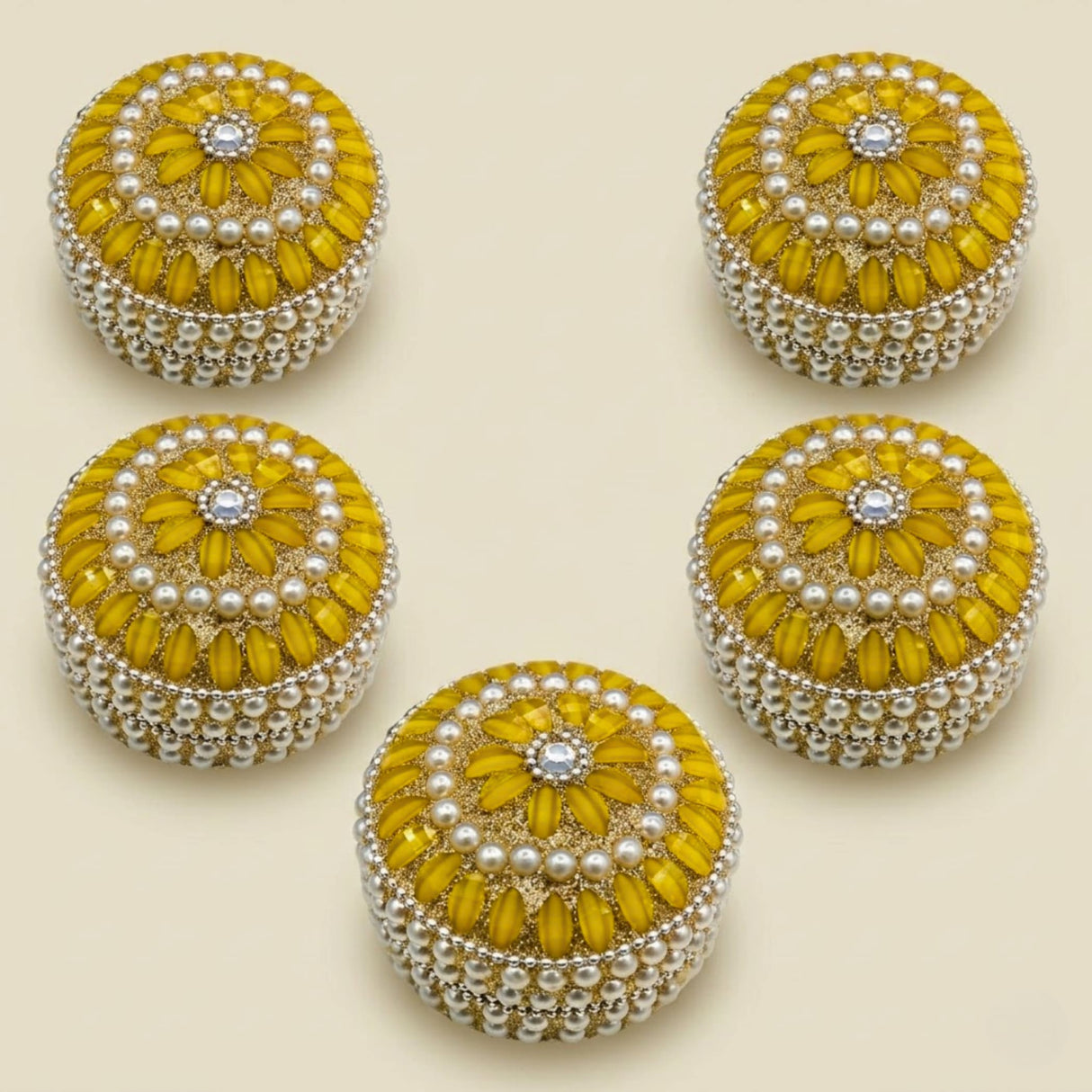 Yellow floral embellished pearl jewelry box with metallic bead detailing for travel and Indian festival gifts