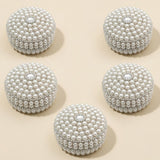 Pearl jewelry box for women with white pearl adornments silver accents and diamond-like centerpiece for travel and gifting