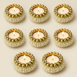 Pearl tealight candle holders adorned with gold and white pearls and sparkling rhinestones for festive home decor