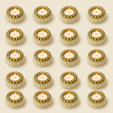 Gold and white beaded pearl tealight candle holders with lit candles for festival of light decor and home centerpiece