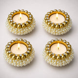 Gold and pearl adorned tealight candle holders with sparkling rhinestones for diwali navratri christmas decor