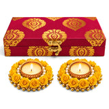 Red and gold patterned handmade candle holder box with ornate clasp ideal for diwali gifts and home decoration
