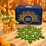 Yellow elephant-shaped diya with floral patterns and green candle in personalized Diwali gifts box for corporate gifting