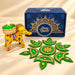 A vibrant yellow elephant figurine with colorful floral patterns and gold-trimmed candle holder for Diwali gifting