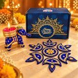 Blue elephant-shaped diya holder with gold accents and lit red candle for personalize Diwali gifts box and corporate gifting