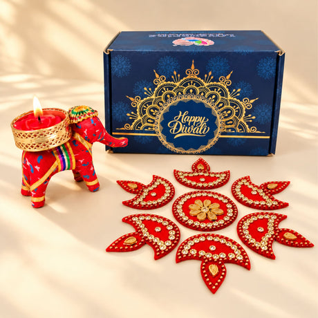 Red elephant-shaped candle holder with gold and colorful decorative accents for diwali and corporate gifting