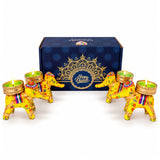 Vibrant yellow elephant-shaped tealight candle holders with intricate floral patterns and gold accents for Diwali gifts