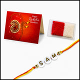 Personalized white bead rakhi with gold lettering and yellow red thread for brother and bhabhi raksha bandhan gift