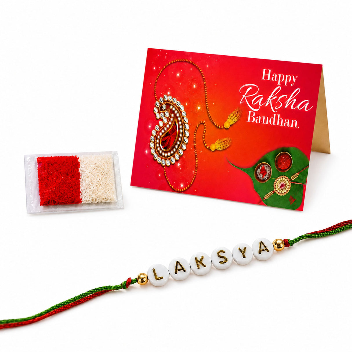 Designer custom named rakhi for brother and bhabhi with white beads green and red thread and gold lettering laksya