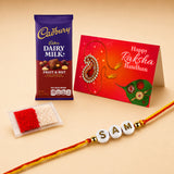 A vibrant red and gold raksha bandhan card with decorative paisley and sparkling embellishments for a personalized rakhi gift