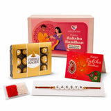 A personalized red and gold rakhi with white beads spelling lakshya on a display card for raksha bandhan gift