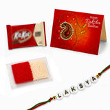 White bead personalized name rakhi with red and green thread handmade for brother and bhabhi raksha bandhan gift