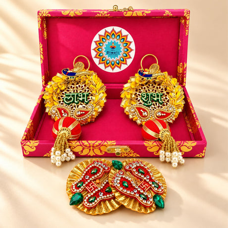 Personalized diwali gifts hamper featuring golden peacock-themed decor with red green embellishments and pearl tassels