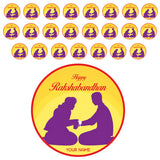 Yellow circular adhesive sticker with purple rakhi exchange silhouettes and red happy rakshabandhan text for gifts