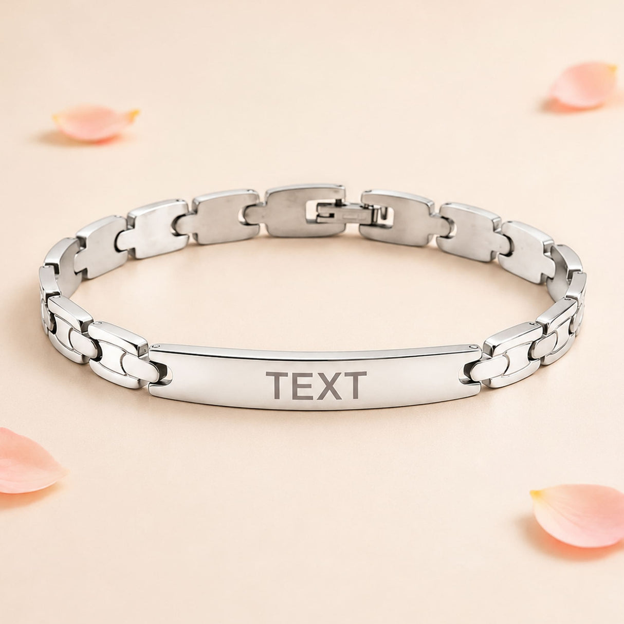 Personalized silver-toned stainless steel rakhi bracelet with sleek chain and central engraved plate for Raksha Bandhan gift