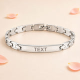 Personalized silver-toned stainless steel rakhi bracelet with sleek chain and central engraved plate for Raksha Bandhan gift