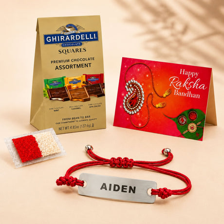 Personalized stainless steel name rakhi with red braided cord and silver rectangular nameplate engraved with Aiden