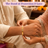 Personalized gold-colored stainless steel name rakhi with alex engraving for brother traditional raksha bandhan gift