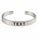 Personalized stainless steel silver-toned open cuff bracelet with smooth finish and engraved black text for raksha bandhan