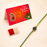 Designer custom single letter rakhi featuring a blue and yellow braided thread with a silver circular engraved charm for protection and good luck