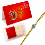 A vibrant orange and green thread designer custom single letter rakhi with a silver charm engraved with the letter n