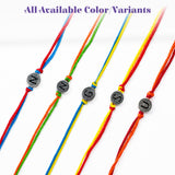 Colorful braided cord designer custom single letter rakhi bracelets with silver toned engraved initial charms for protection and luck