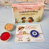 A vibrant blue mosaic rakhi with gold trim and central eye design on a decorative card from a plantable seed rakhi set