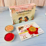 A vibrant red and gold floral plantable seed rakhi with a yellow ribbon eco-friendly for vrikshabandhan gift