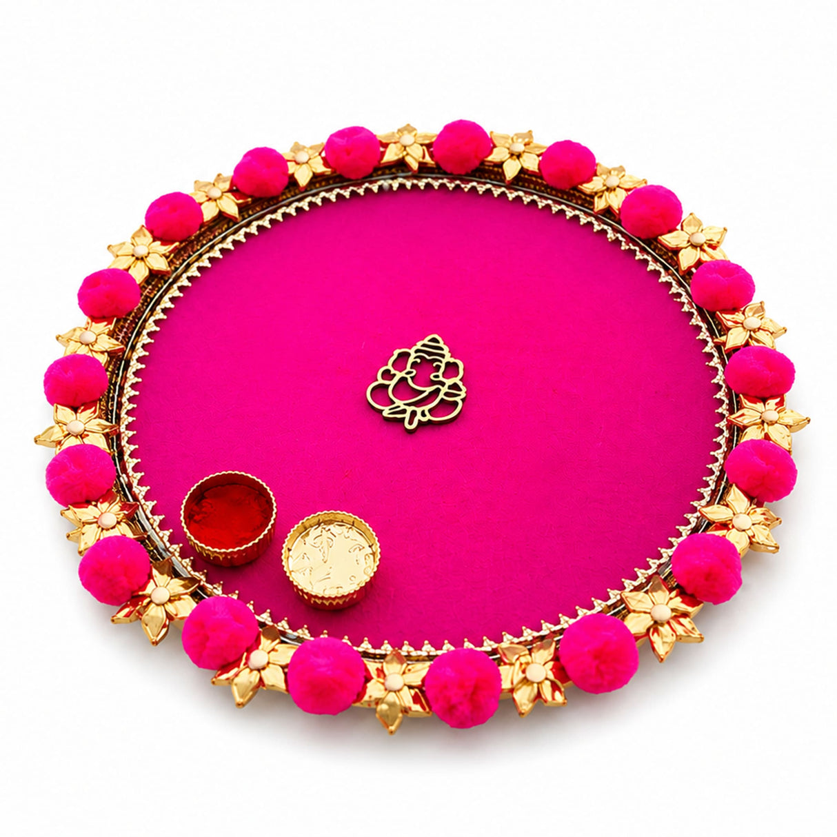 Steel pompom ganesha decorated pooja thali vibrant pink with golden border floral motifs and central gold ganesha charm