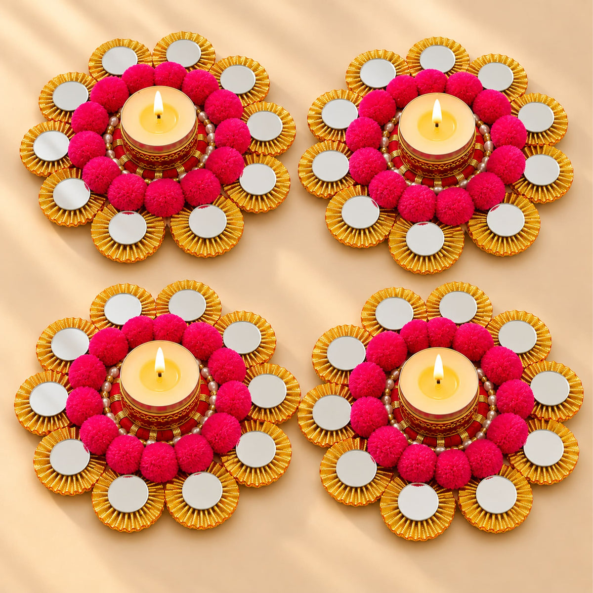 Vibrant pink and gold rangoli mat tealight candle holder with mirrored petals for festive home decor and gifting