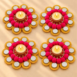 Vibrant pink and gold rangoli mat tealight candle holder with mirrored petals for festive home decor and gifting