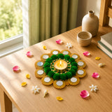 Green and gold decorative tea light candle holder with mirrored accents for diwali pooja and festive home decor