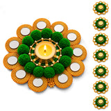 Rangoli mat tealight candle holder with golden and green mirrored petals and fluffy pom-poms for festive decor