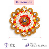 A 12-inch vibrant rangoli mat tealight candle holder with a central lit diya and fabric flowers for Diwali pooja