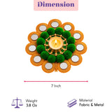 A 7 inch rangoli mat tealight candle holder with green pom-poms gold metal frame mirrored circles for festive decor