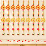Vibrant handcrafted 2 strings wall backdrop hanging with woven red and gold pompom wheels beads and pink tassels for Diwali decor