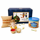 White and gold ganesha figurine with intricate detailing included in raksha bandhan gift hamper for brother and bhabhi