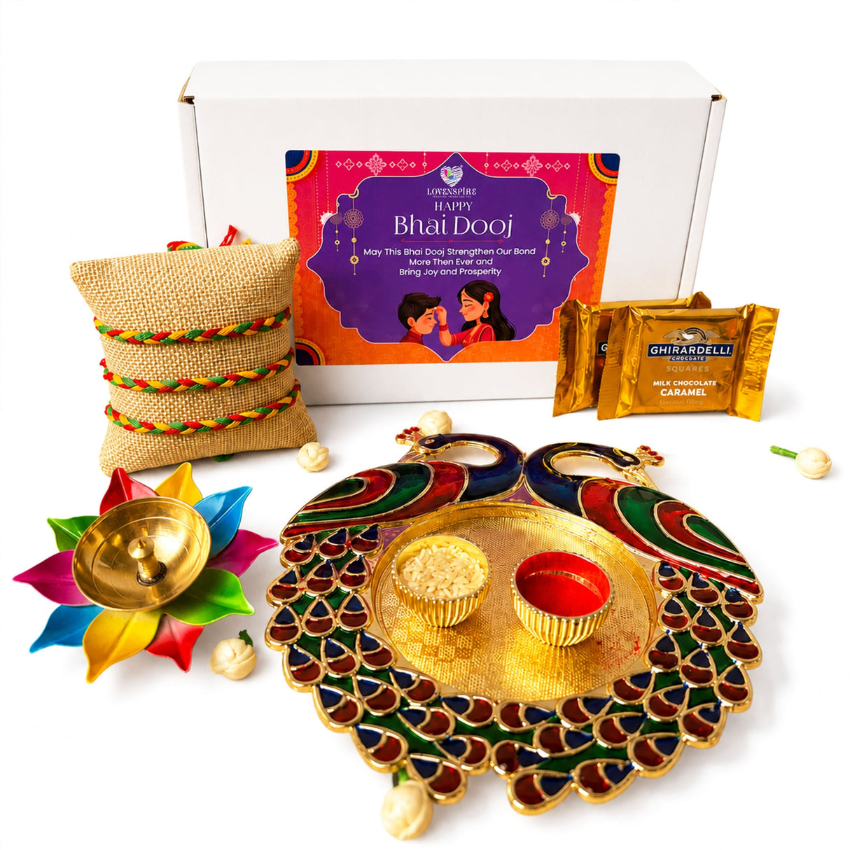 Gold-colored peacock-shaped brass thali with intricate multicolored enamel detailing and two small bowls for bhai dooj gift hamper