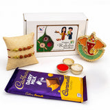 Raksha bandhan gift hamper featuring cadbury dairy milk caramello chocolate bar in purple yellow gold foil packaging