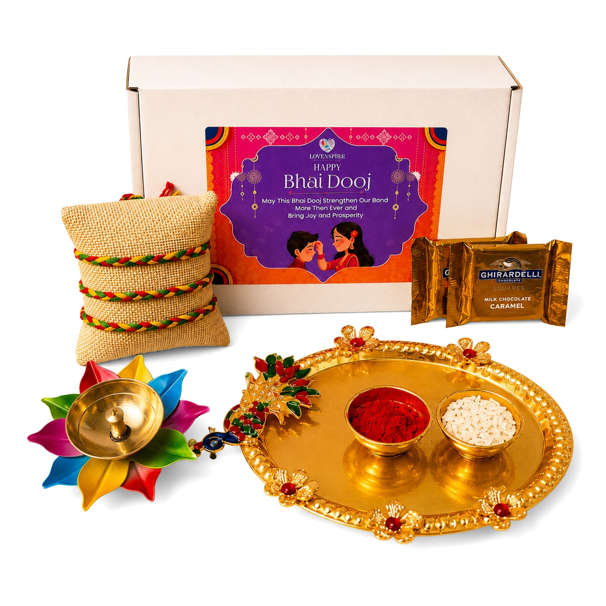 Gold ornate tray with floral embellishments holding two bowls of red powder and white rice in bhai dooj gift hamper