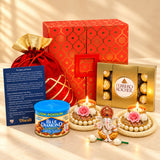Red velvet drawstring potli bag with gold trim and lattice pattern in diwali gift hamper for indian festival gifting