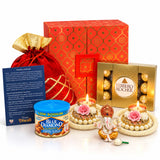 Red velvet drawstring potli bag with gold trim and golden lid for Diwali gift hamper Indian festival hamper