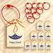 White paper happy diwali gift tag with blue and orange lantern design and red string for hanging presents and party favors