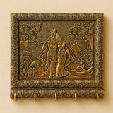 Antique brass wall plaque of radha krishna with cow featuring intricate floral relief and five key hooks for entryway use